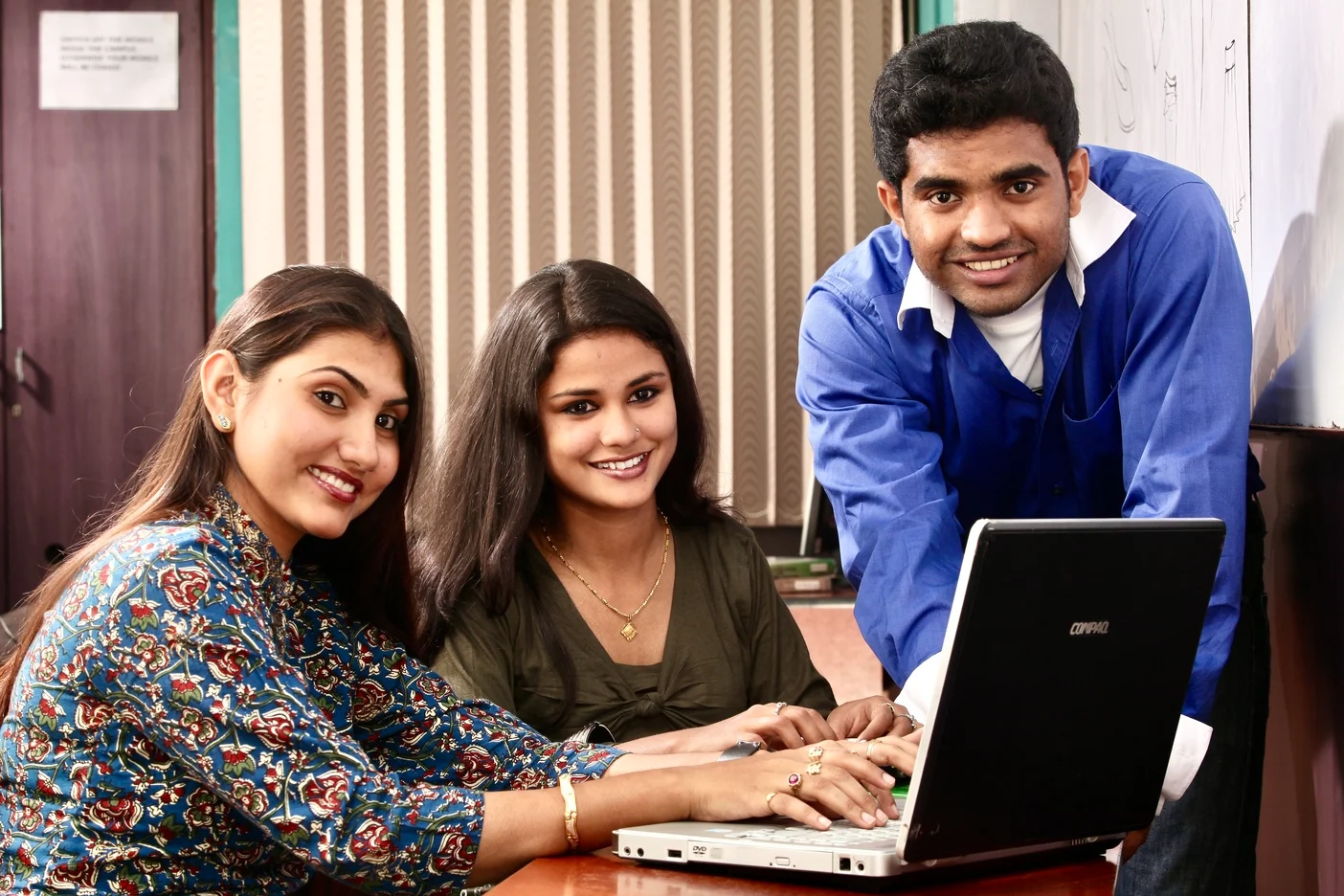 Students learning with laptop